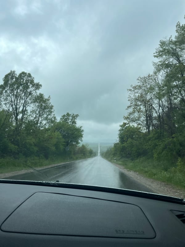 Driver documents rainy road conditions in rural Bulgaria