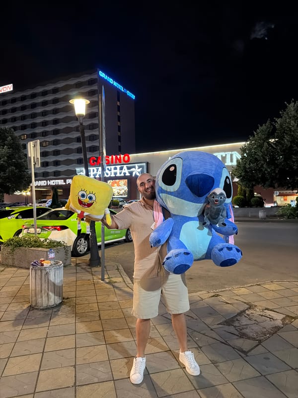 Giant SpongeBob and Stitch plushies carried through Plovdiv at night