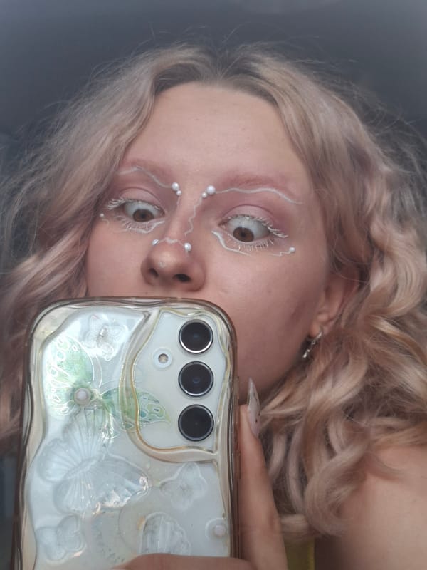 Makeup artistry and pet cuddles in Donetsk apartment