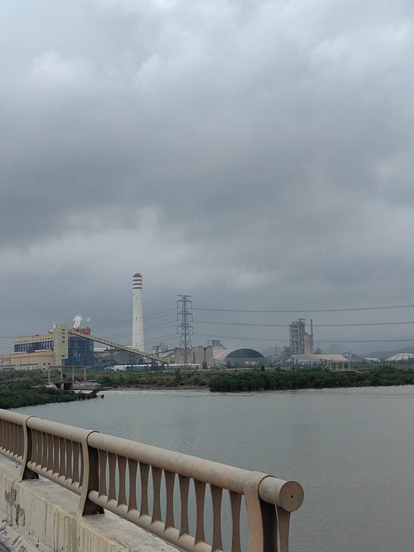 Overcast morning view of industrial area from Vietnamese bridge