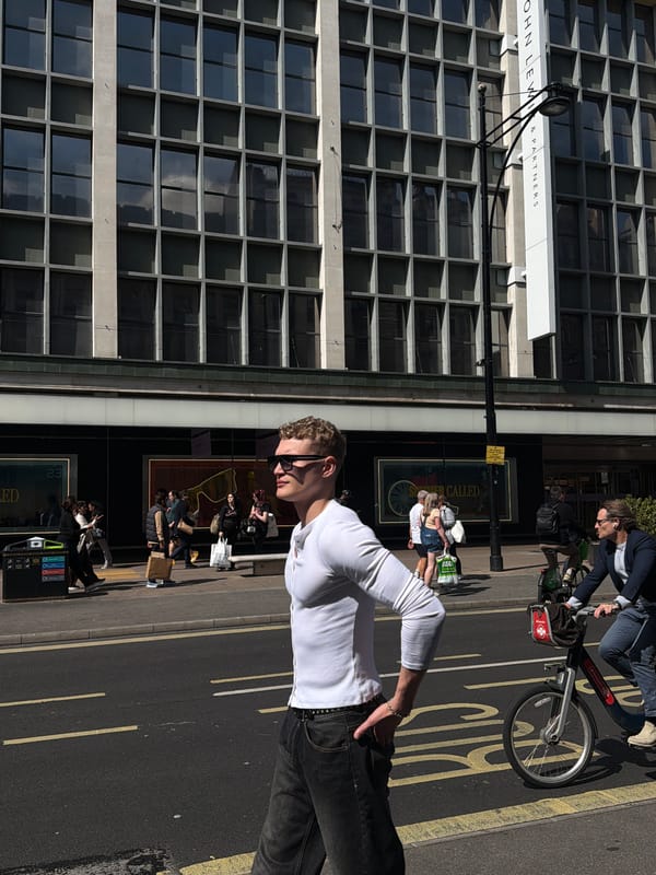 Crowd queues outside London Swatch store near John Lewis