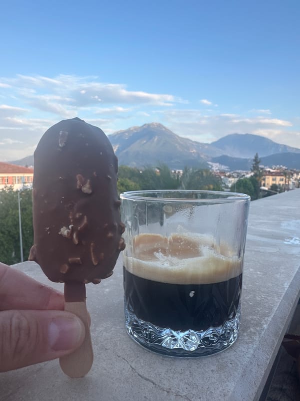Person enjoys ice cream with espresso in Fethiye, Turkey