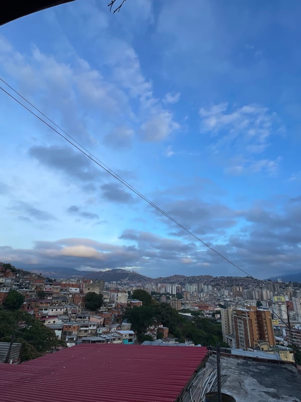 Witness documents Caracas cityscape under cloudy skies