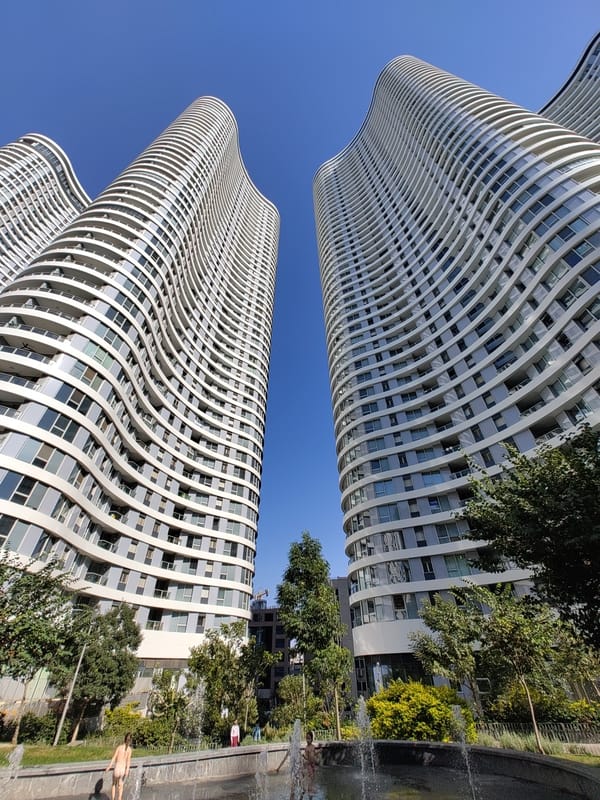 Tel Aviv's curving white towers and the park below