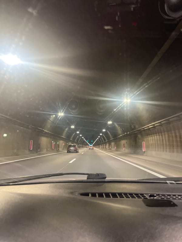 Underground tunnel with vehicles observed by witness