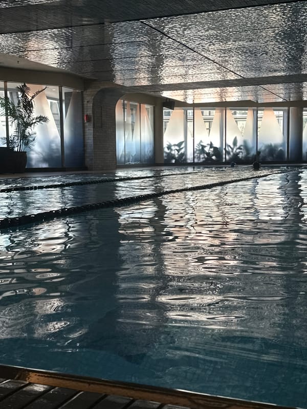 Indoor lap pool with lane ropes and clear water