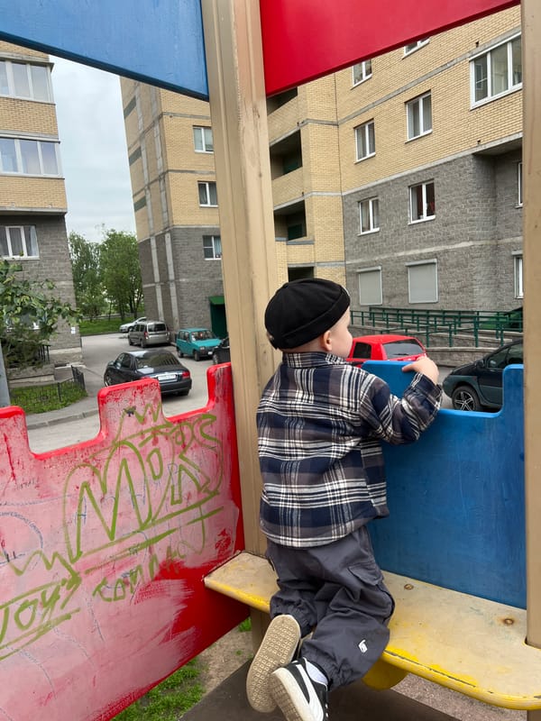 Father and child enjoy afternoon at Saint Petersburg playground