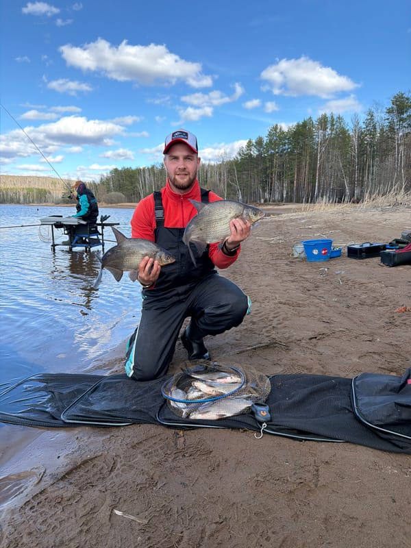 Fishermen land catch along Chaykovsky shoreline