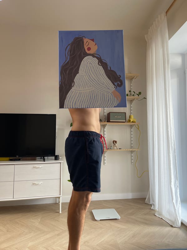 Person with painting observed in furnished room