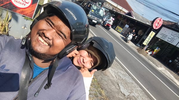 Street life documented in Prigen, Indonesia shows motorcyclists and vendors
