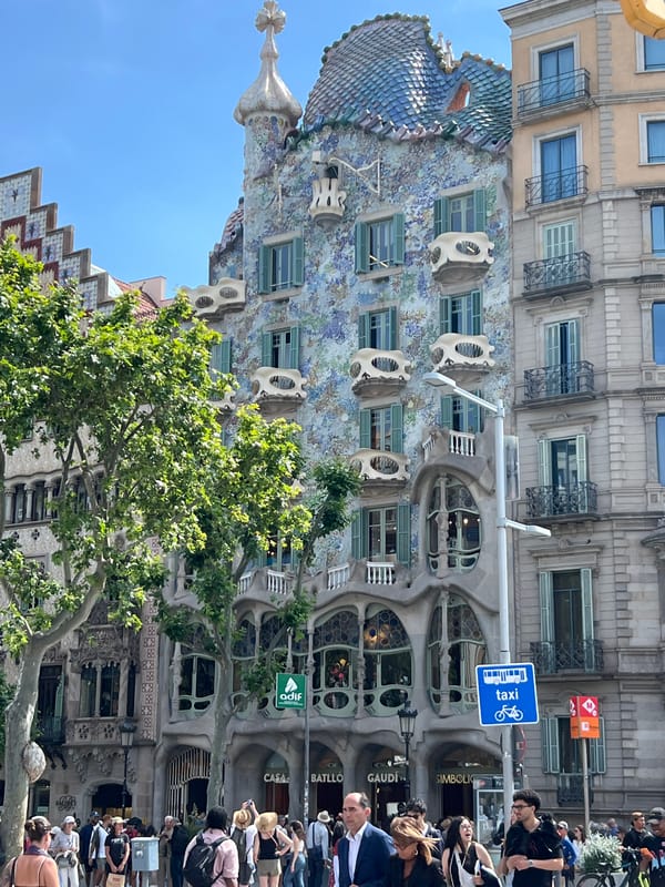 Tourist captures Gaudí's Casa Batlló facade in Barcelona