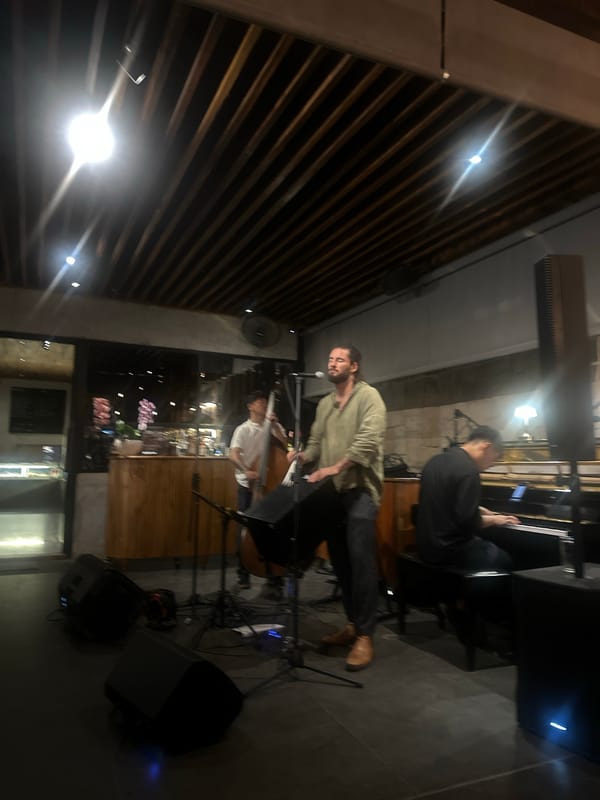 Jazz band plays a late evening set at a cozy urban cafe