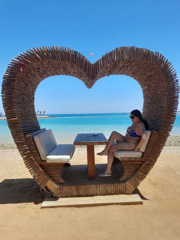 Woman enjoys morning beach photo session in Hurghada