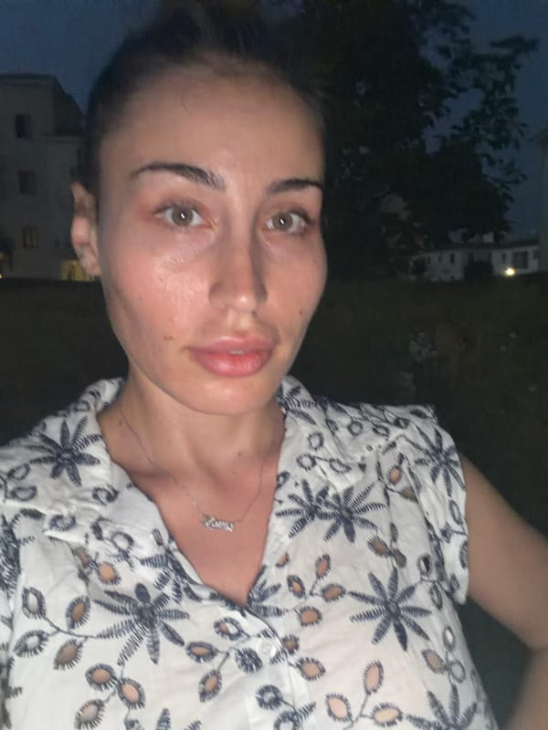 Woman documents evening stroll through Tersefanou, Cyprus at twilight