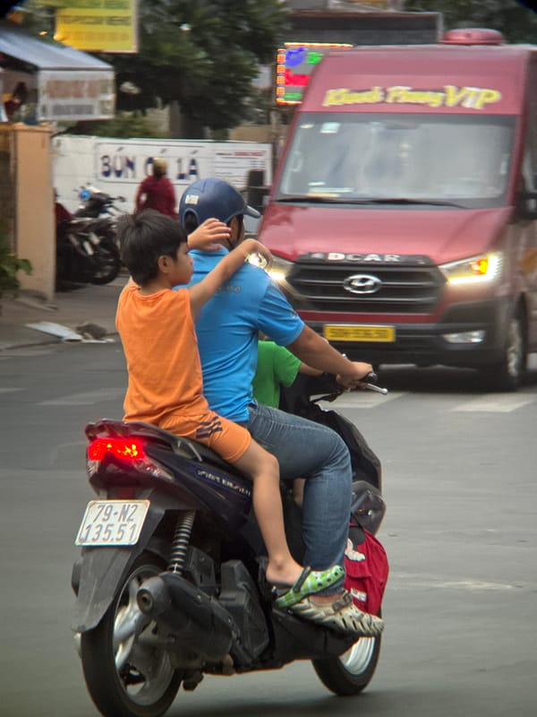 Everyday street life along Nha Trang's coastal promenade