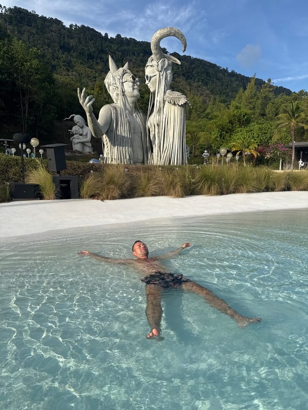 Resort guests enjoy pool, sculptures at Baan Lipa Noi facility