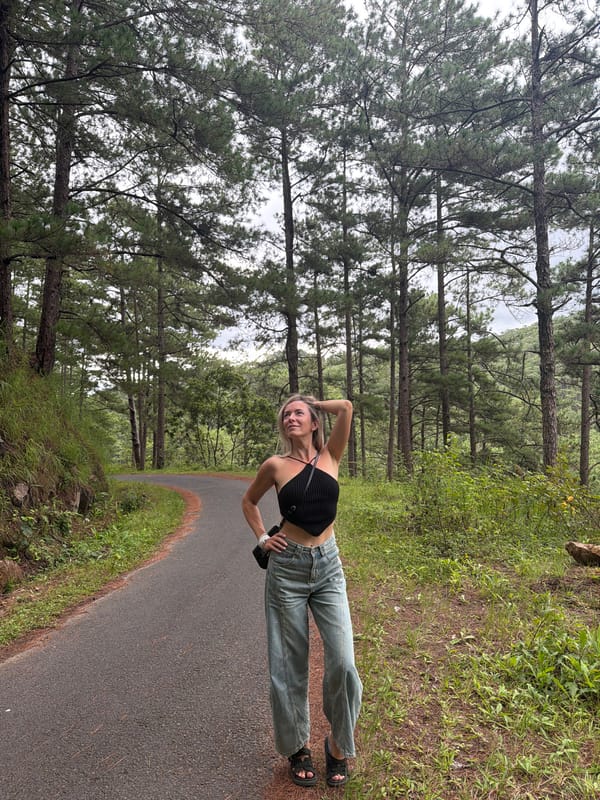 Posing on a pine forest road in Da Lat's highlands