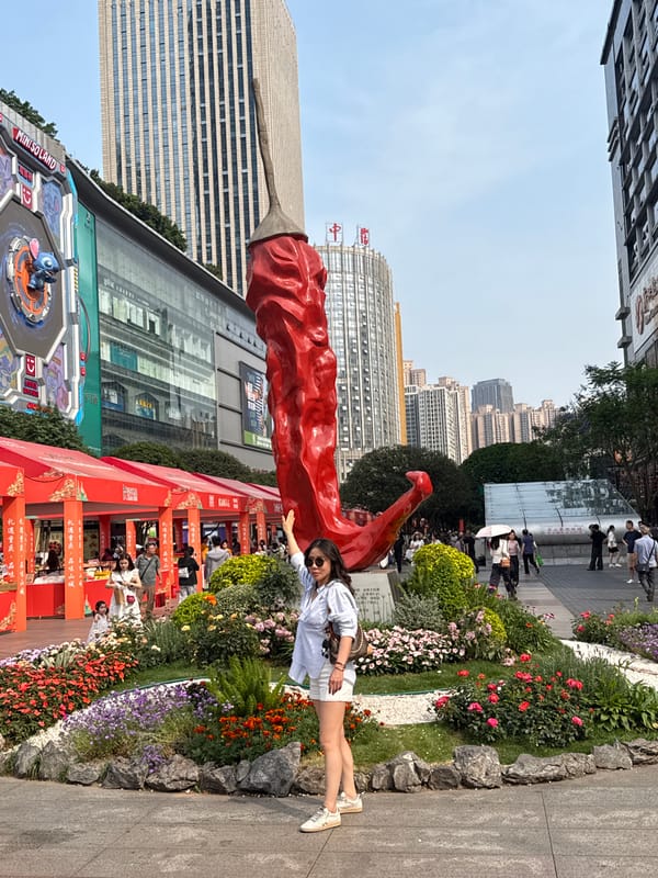 Morning activities captured around chili pepper statue in Liangjiang