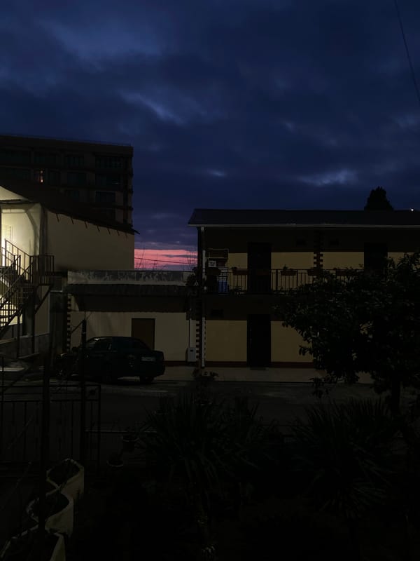 Dusk street scene captured in residential Sochi neighborhood