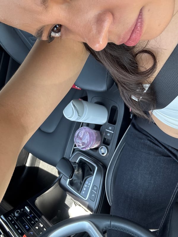 Person takes selfie inside car in Puebla, Mexico