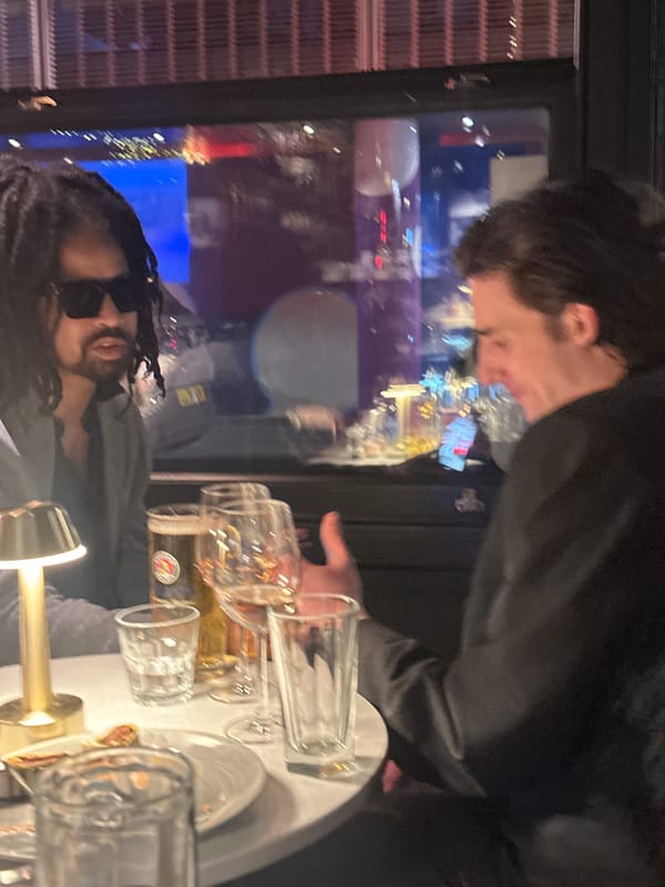 London diners share photos on smartphones during evening out