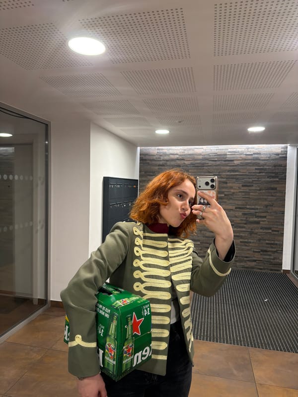 Woman in military jacket takes selfies around Strasbourg