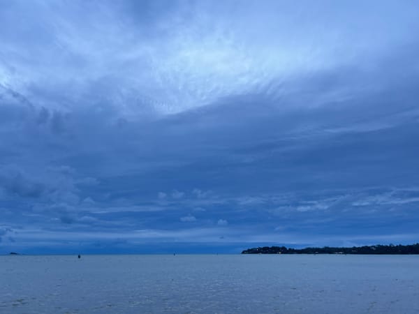 Overcast morning on Ko Pha-ngan's rocky, tidal shoreline
