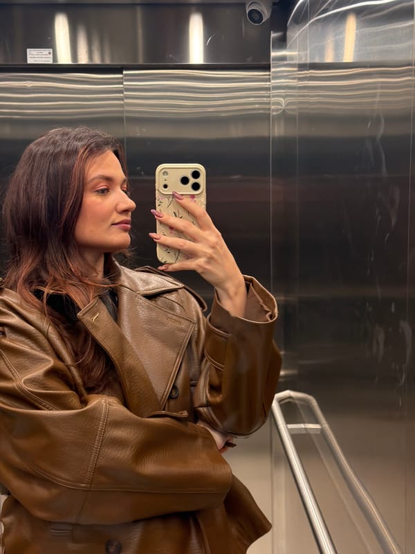 Woman takes elevator selfie in Belgrade