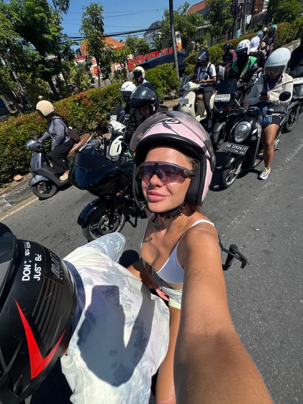 Heavy motorcycle traffic jam captured in Denpasar streets