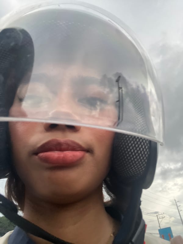 Helmet selfies and street traffic during a Davao City morning ride