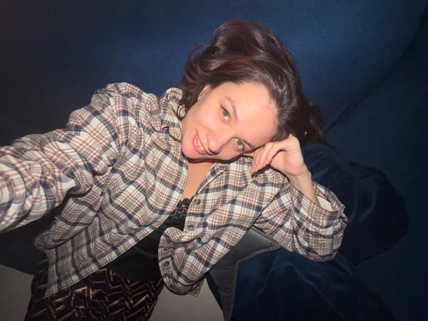 Woman photographed relaxing on couch in Belgrade apartment