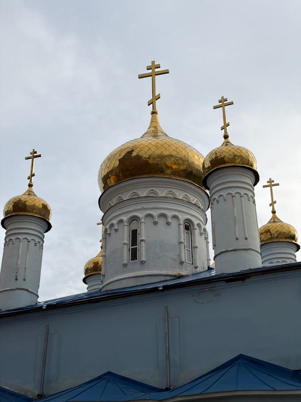 Tourist documents Kazan Kremlin landmarks during afternoon visit