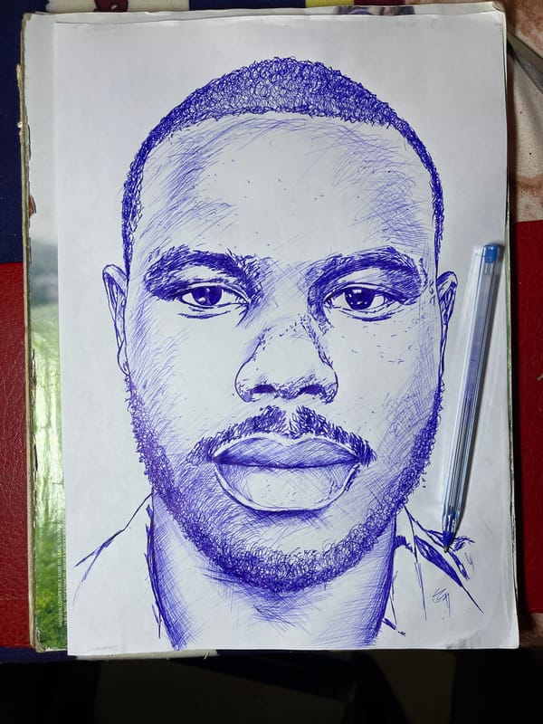 Artist creates blue ink portrait alongside digital artwork in Jos