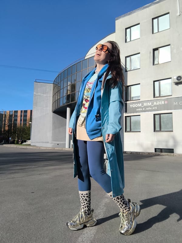 Woman in orange sunglasses spotted walking in Riga