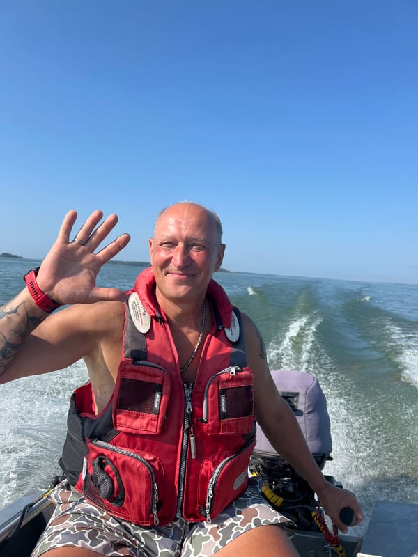 Boat ride on a sunny day near Beregovoe, Russia