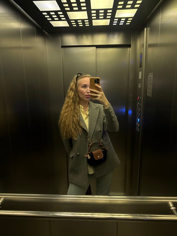 Person takes selfie in elevator in Sirius, Russia