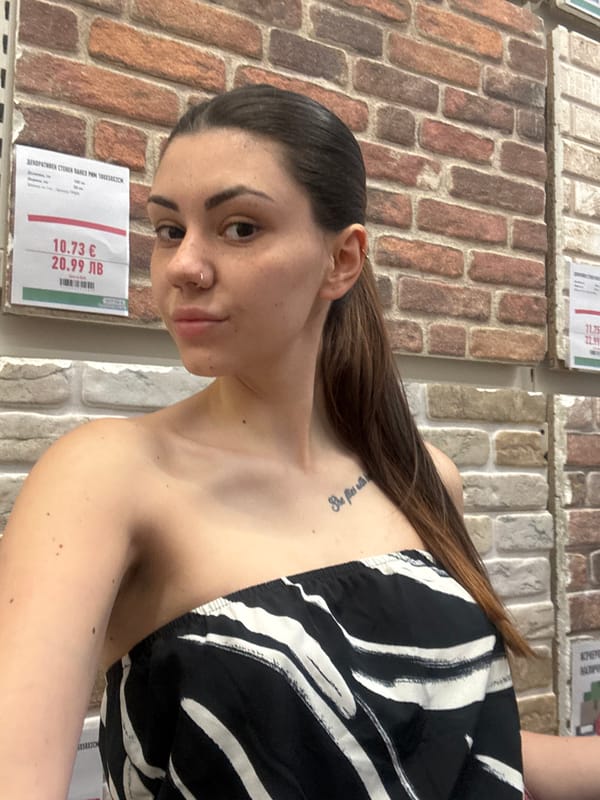 Woman poses for photos in Sofia retail store
