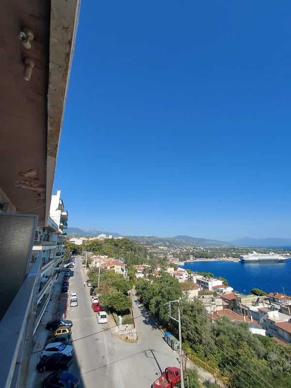 Aegio harbor views mixed with laid-back screen browsing