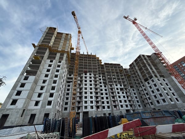 Moscow residential construction site, worker selfie included