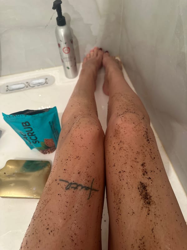 Person bathing with dark particles in Gavrilkovo shower