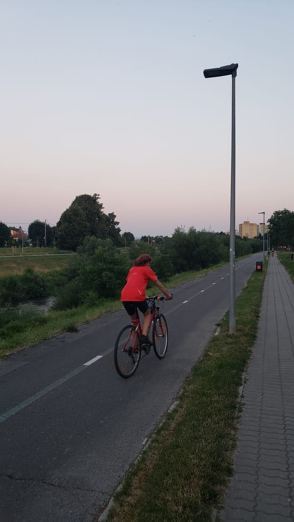 Summer evening along Prešov's riverside paths at sunset