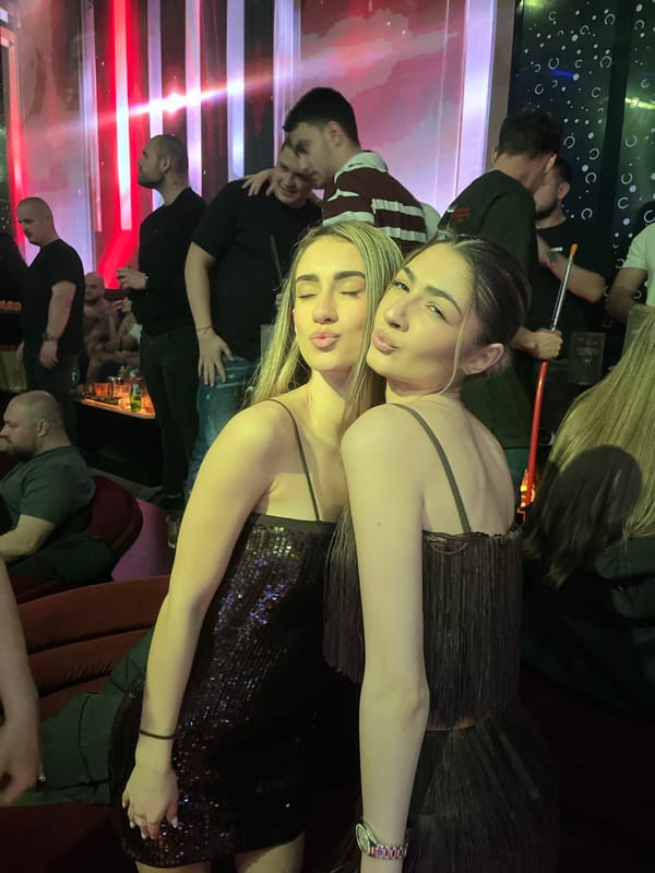 Women celebrate with champagne at Burgas nightlife venue