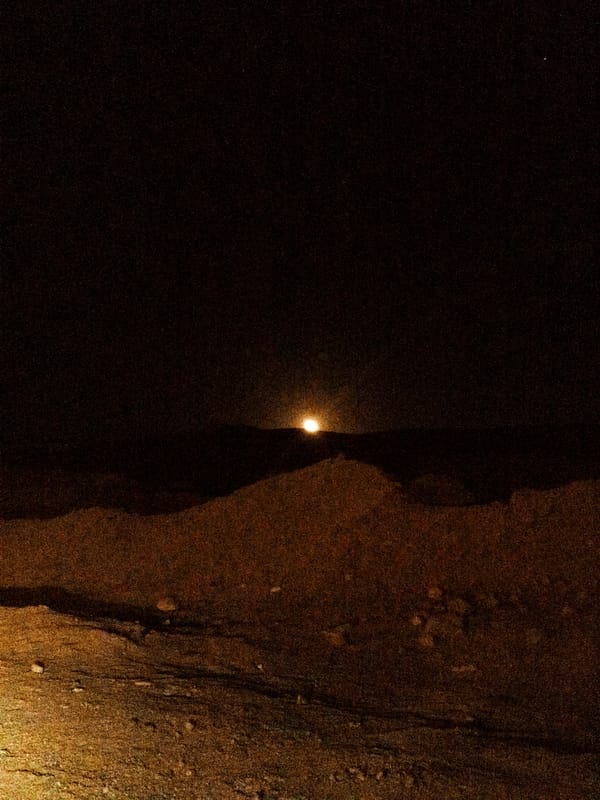 Nighttime documentation of illuminated Makadi Heights resort signage in Egypt