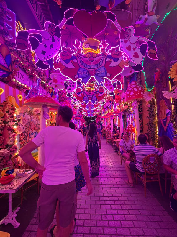 Alice in Wonderland-themed neon district lights up Athens night