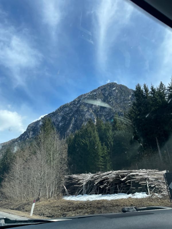 Driver captures scenic mountain views during Italian Alps journey