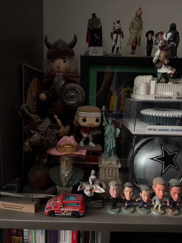 Personal collectibles shelf documented in Mexico City home