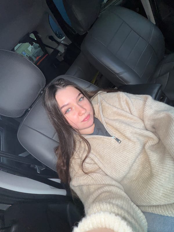 Woman takes car selfies in Perm, Russia