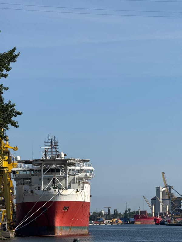 Ferries and a support vessel in motion on the Gdańsk waterway