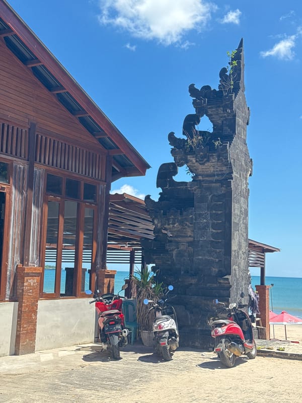 Urban scenes captured: Balinese gate, motorcycle rider, street market