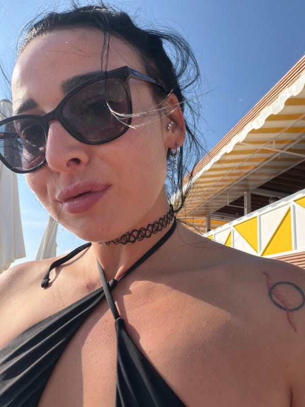Woman takes selfie in black bikini in Shepsi, Russia